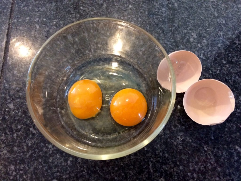 Doubled yolked egg, cracked