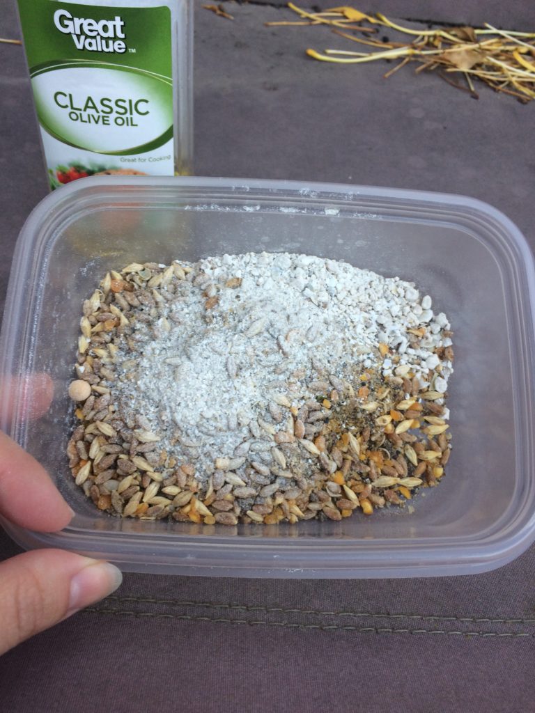 Oyster shell powder on top of chicken feed